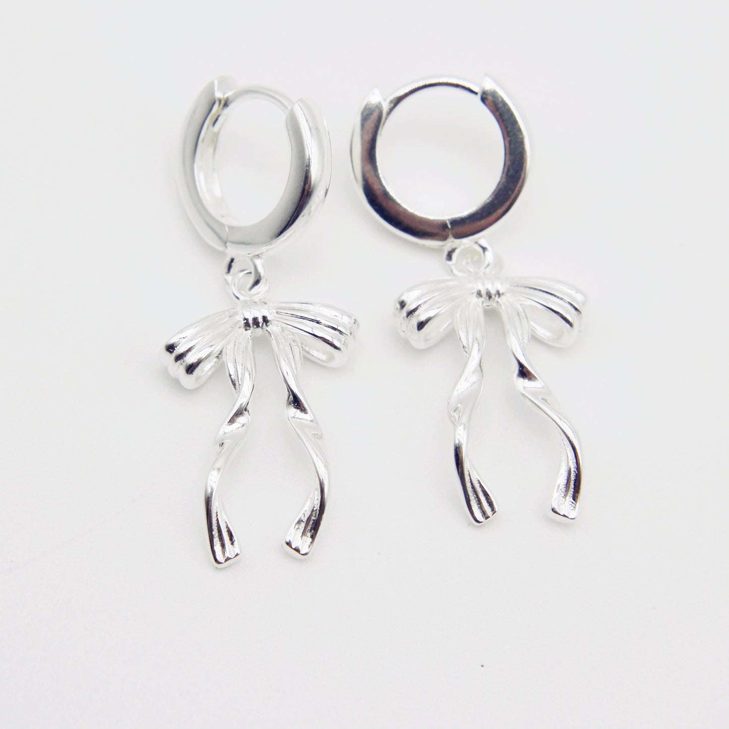 Sterling Silver Bow Drop Huggie Earrings