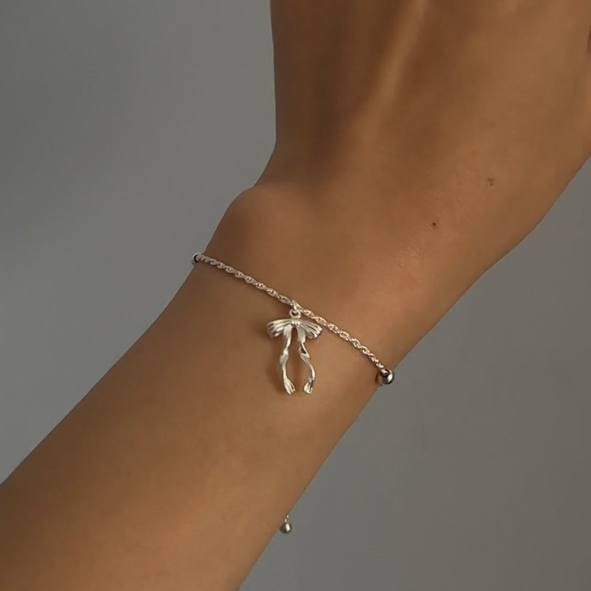 Sterling Silver Bow Charm Adjustable Bracelet